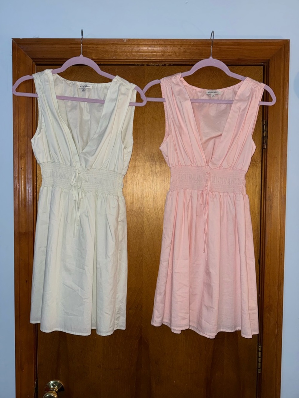 TWO Sleeveless Smocked-Waist Casual Dresses, one in Pink & one in Cream